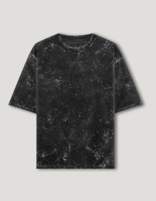 Black marble-textured t-shirt on a light gray background