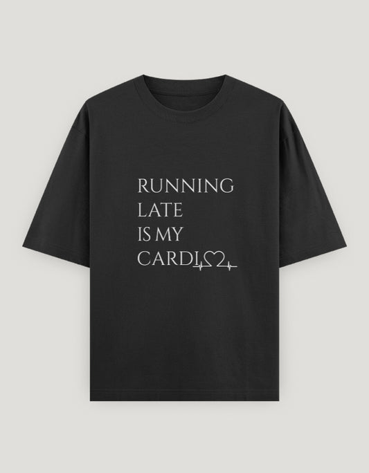 Black t-shirt with white text 'RUNNING LATE IS MY CARDIO' on a light gray background