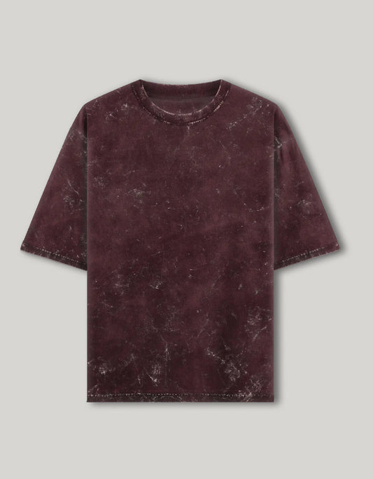 Maroon marble textured t-shirt on a light gray background