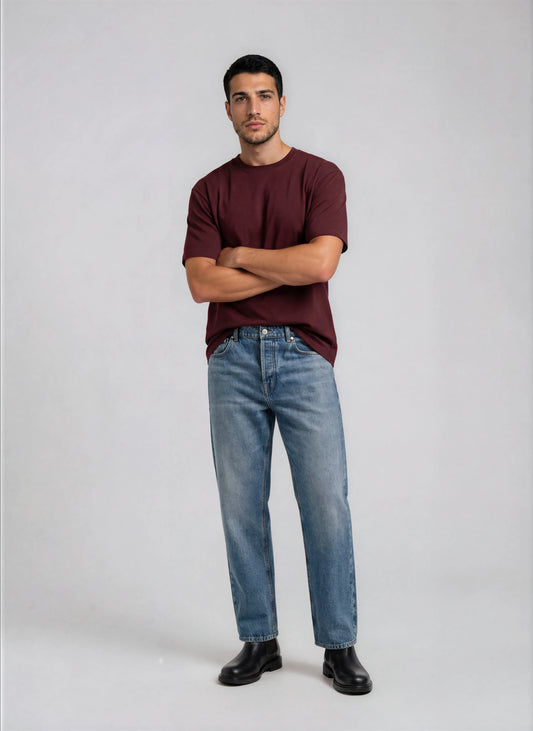 Man wearing plain maroon t-shirt