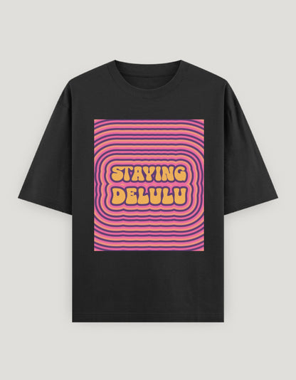 Black t-shirt with pink and yellow graphic design on a gray background